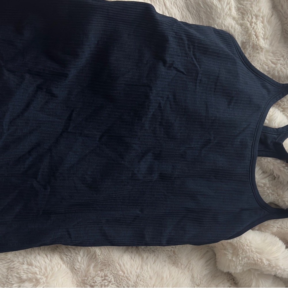 Navy lululemon ebb to street tank top size 10